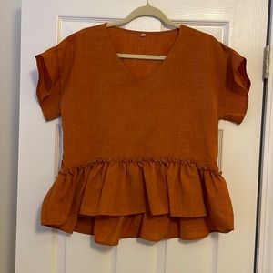 Burnt Orange peplum top